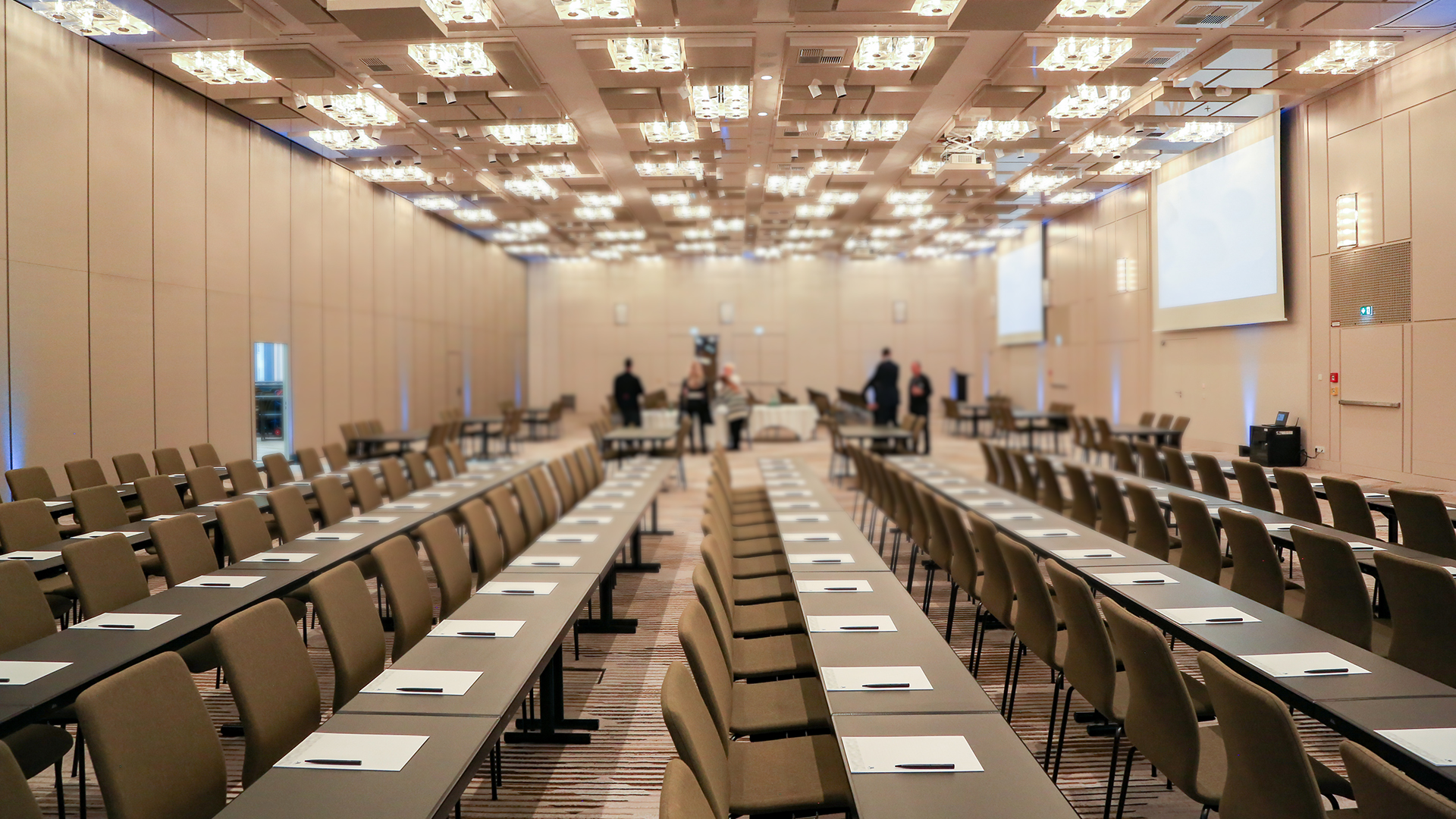 Hotel ballroom laid out for a pharmaceutical conference session produced by event management agency Brella Productions.