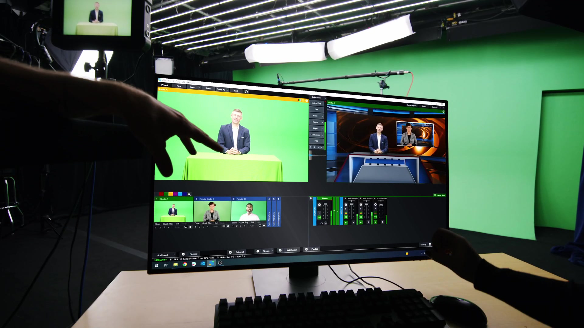 Greenscreen studio with director’s monitor displaying virtual event elements