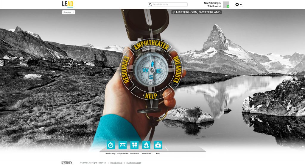 Screen shot of virtual environment home page designed by Brella Productions, featuring a hand holding a compass with picturesque mountains in the background.