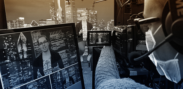 In the foreground, a masked Brella event agency camera operator films a female presenter sitting in a studio addressing the camera.